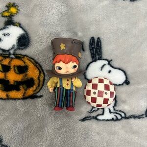 Striped Clown Figurine with Checkered Ball